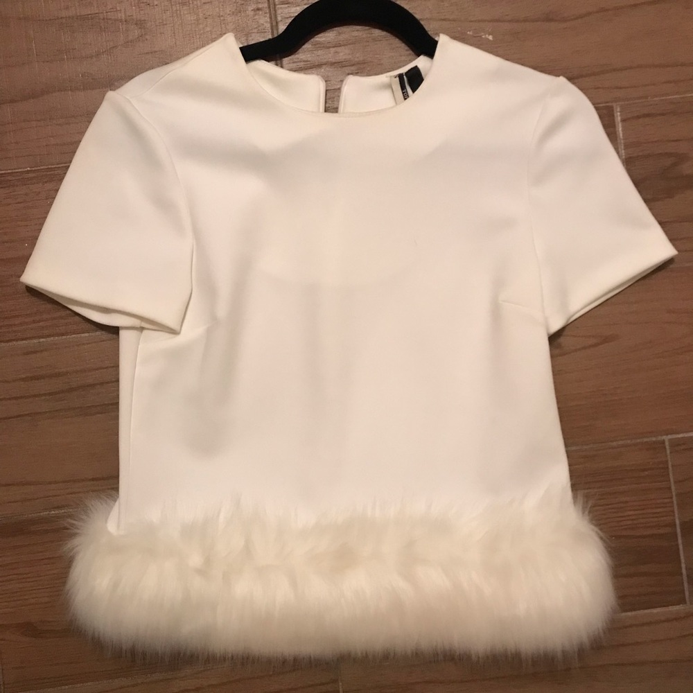 White top with fur detail